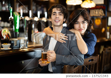 Couple in love is spending time at bar Couple in love is spending time at bar 137521343