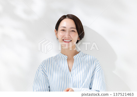 A smiling middle woman A smiling middle woman 137521463