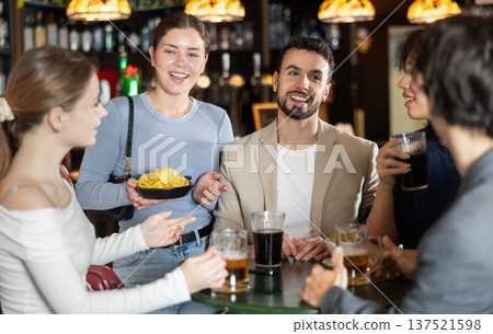 Young people spend time at bar Young people spend time at bar 137521598