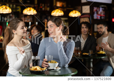 Girls spend time at bar. Girls spend time at bar. 137521600