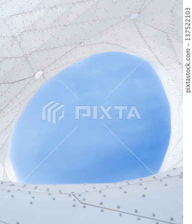 A view of the blue sky through the opening of a geometric membrane structure A view of the blue sky through the opening of a geometric membrane structure 137522103