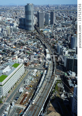 Tobu Limited Express train and skyscrapers seen from Solamachi March Tobu Limited Express train running on Sumida 206 Oshiage 137523258