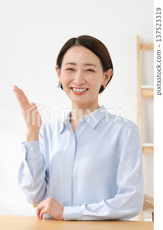 Woman waving her hands Woman waving her hands 137523319