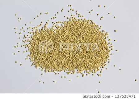 This is millet rice placed on a white background. 137523471