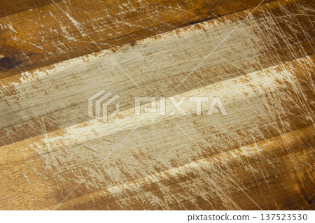 A close-up of an old wooden cutting board. A close-up of an old wooden cutting board. 137523530