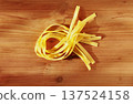 Dried tagliatelle pasta studio shot 137524158
