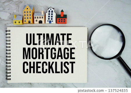 Ultimate Mortgage Checklist text written on notepad with house model and magnifying glass on marble background Ultimate Mortgage Checklist text written on notepad with house model and magnifying glass on marble background 137524835