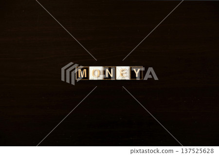 "MONEY" letter tiles: money, finance, investment concept "MONEY" letter tiles: money, finance, investment concept 137525628