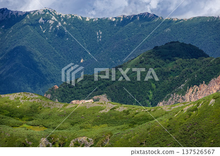 View of Mount Tsurugidake in the Northern Alps from the climb to Mount Mozawa View of Mount Tsurugidake in the Northern Alps from the climb to Mount Mozawa 137526567
