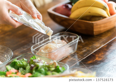 Hands of a woman cooking (koji dishes) 137528173