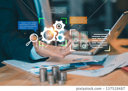 Businessman using AI and gear icons to optimize business process, productivity, management and data analysis for success. Businessman using AI and gear icons to optimize business process, productivity, management and data analysis for success. 137528487