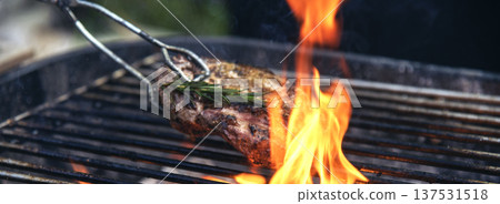 Banner BBQ Barbecue grilled meat stick on fire flame hot charcoal cooking outdoor. Banner Beef grilling picnic rib smoke bacon american cuisine. Grill pork heat bbq rack fire flame with copy space 137531518