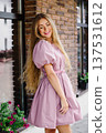 Fashionable Woman Smiling In Pink Dress 137531612