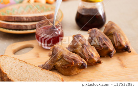 Roasted Partridges on Wooden Board Roasted Partridges on Wooden Board 137532083