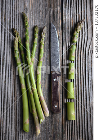 Sliced and whole raw green asparagus spears Sliced and whole raw green asparagus spears 137532170