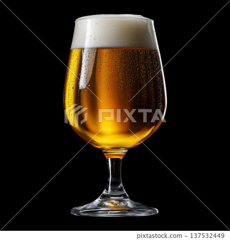 Foamy amber ale beer in a tall tulip glass with creamy foam head, isolated on black background, concept of refreshment and taste Foamy amber ale beer in a tall tulip glass with creamy foam head, isolated on black background, concept of refreshment and taste 137532449