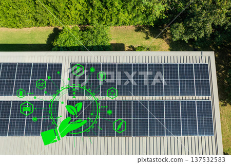 Solar photovoltaic panels on roof on a top of house . Concept of renewable energy home. Solar photovoltaic panels on roof on a top of house . Concept of renewable energy home. 137532583