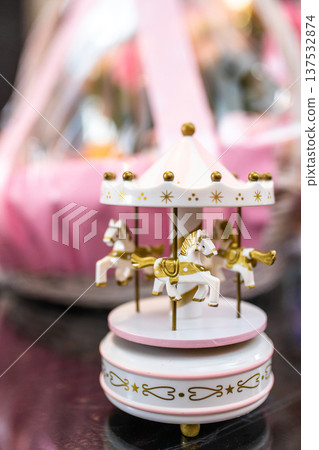 Pink and Gold Carousel Music Box Close-Up 137532874