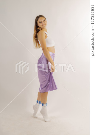 Beautiful young girl in fashionable clothes on Beautiful young girl in fashionable clothes on 137535655