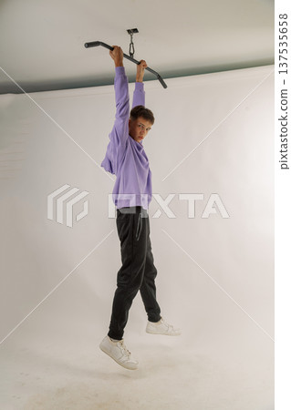 Handsome young guy in stylish clothes on white 137535658