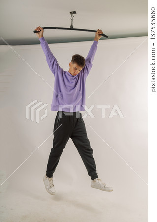 Handsome young guy in stylish clothes on white Handsome young guy in stylish clothes on white 137535660