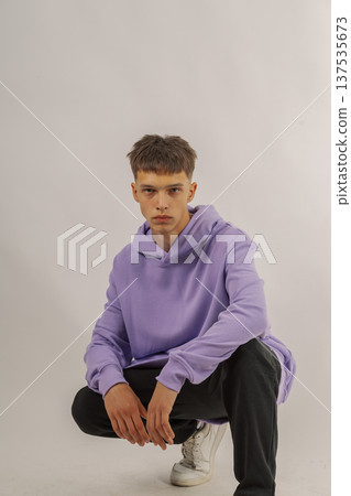 Handsome young guy in stylish clothes on white 137535673