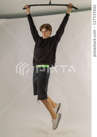 Handsome young guy in stylish clothes on white 137535682