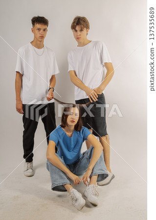 Group of young people in stylish clothes on white 137535689