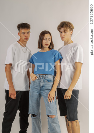 Group of young people in stylish clothes on white 137535690