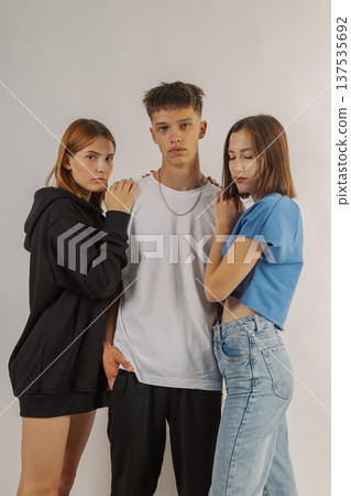 Group of young people in stylish clothes on white 137535692