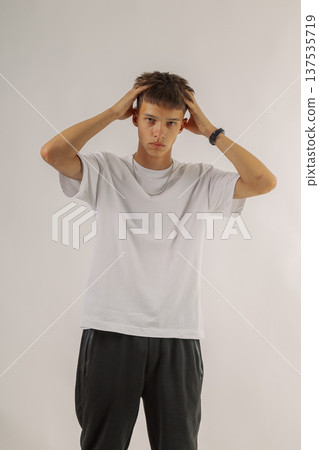 Handsome young guy in stylish clothes on white 137535719