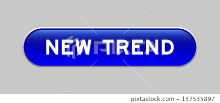 Blue color capsule shape button with word new trend on gray background 137535897