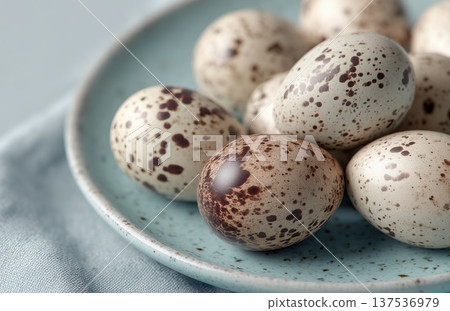 Speckled Eggs On Turquoise Plate 137536979