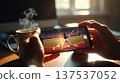 Watching Baseball on Smartphone With Morning Coffee 137537052