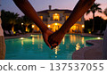 Couple Holding Hands by Pool at Luxury Villa 137537055