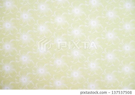 Soft yellow floral pattern with white flowers on a light green background Soft yellow floral pattern with white flowers on a light green background 137537508