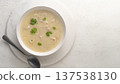 Georgian traditional chicken soup Chikhirtma in the white plate, flat lay 137538130