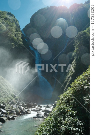 Shomyo Falls in summer: A powerful view of the waterfall and clear streams bathed in sunlight Shomyo Falls in summer: A powerful view of the waterfall and clear streams bathed in sunlight 137538203