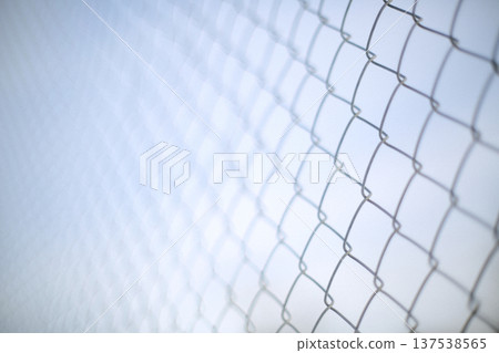 Close up rusty wire fence and blurred background. Close up rusty wire fence and blurred background. 137538565