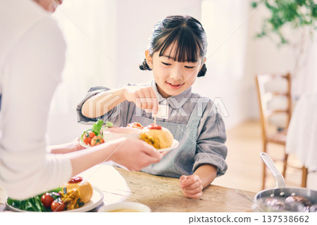 Girl helping with meals 137538662