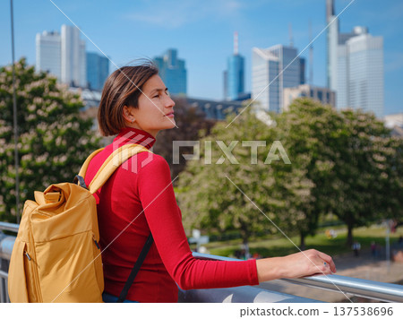Tourist woman explores modern Frankfurt, 137538696