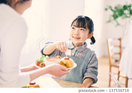 Girl helping with meals 137538718