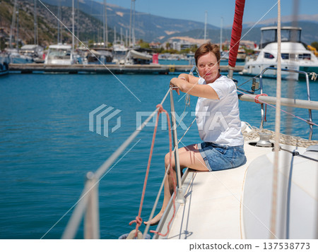 Adult Woman Enjoying Sunny Day On Yacht Finike Marina Turkey Adult Woman Enjoying Sunny Day On Yacht Finike Marina Turkey 137538773