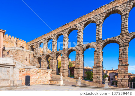 Segovia, Spain. Ancient Roman aqueduct on Plaza del Azoguejo square Segovia, Spain. Ancient Roman aqueduct on Plaza del Azoguejo square 137539448