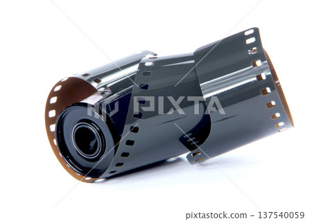 Old 35 mm film strip on a white background Old 35 mm film strip on a white background 137540059