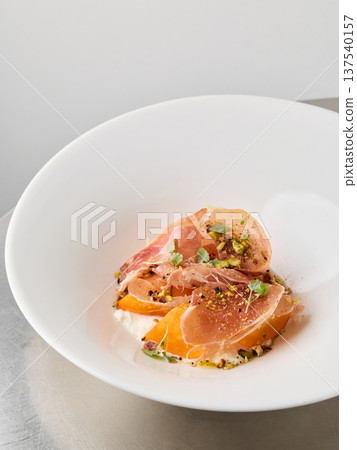 Bright citrus pieces enhanced with subtle savory and herbal notes 137540157
