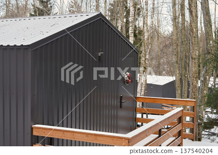 Charming lakeside cabin with seasonal ornaments and rustic charm Charming lakeside cabin with seasonal ornaments and rustic charm 137540204