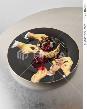 Numerous individuals eagerly participate in cherry sauce delight Numerous individuals eagerly participate in cherry sauce delight 137540206