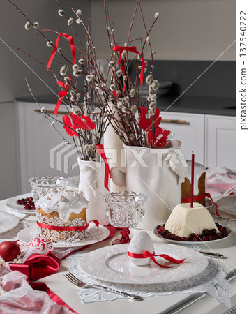 Intimate holiday table featuring natural elements and subtle lighting Intimate holiday table featuring natural elements and subtle lighting 137540222