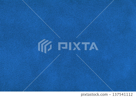 Dark blue suede fabric background with matte nap velvet texture. Royal blue tones and soft felt textile surface in macro Dark blue suede fabric background with matte nap velvet texture. Royal blue tones and soft felt textile surface in macro 137541112